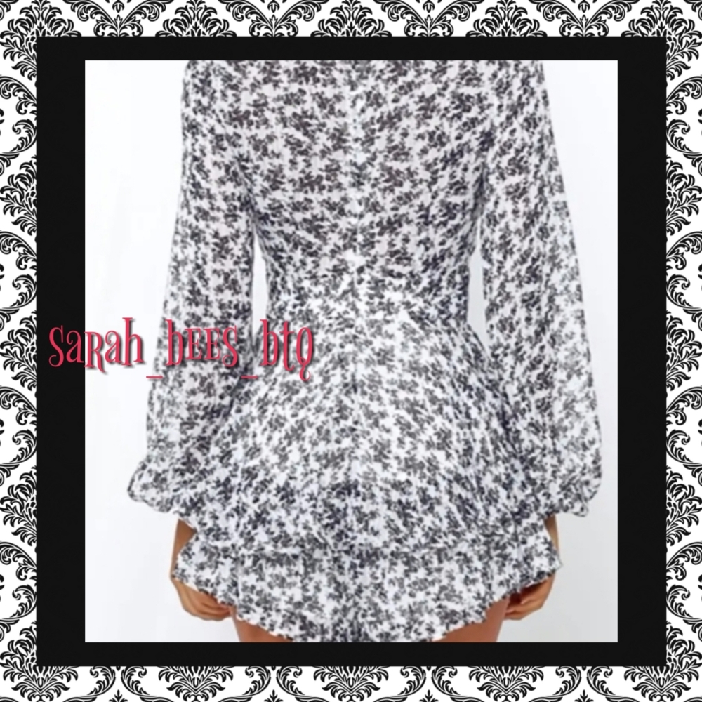 Black & White Floral Wrap Romper with Ruffle Skirt - Picture 2 of 9